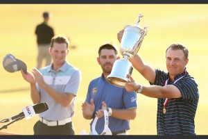 Jordan Spieth holds the trophy during the final round of the 2015 U.S. Open at Chambers Bay in University Place, Wash. on Sunday, June 21, 2015. (Copyright USGA/Darren Carroll)
