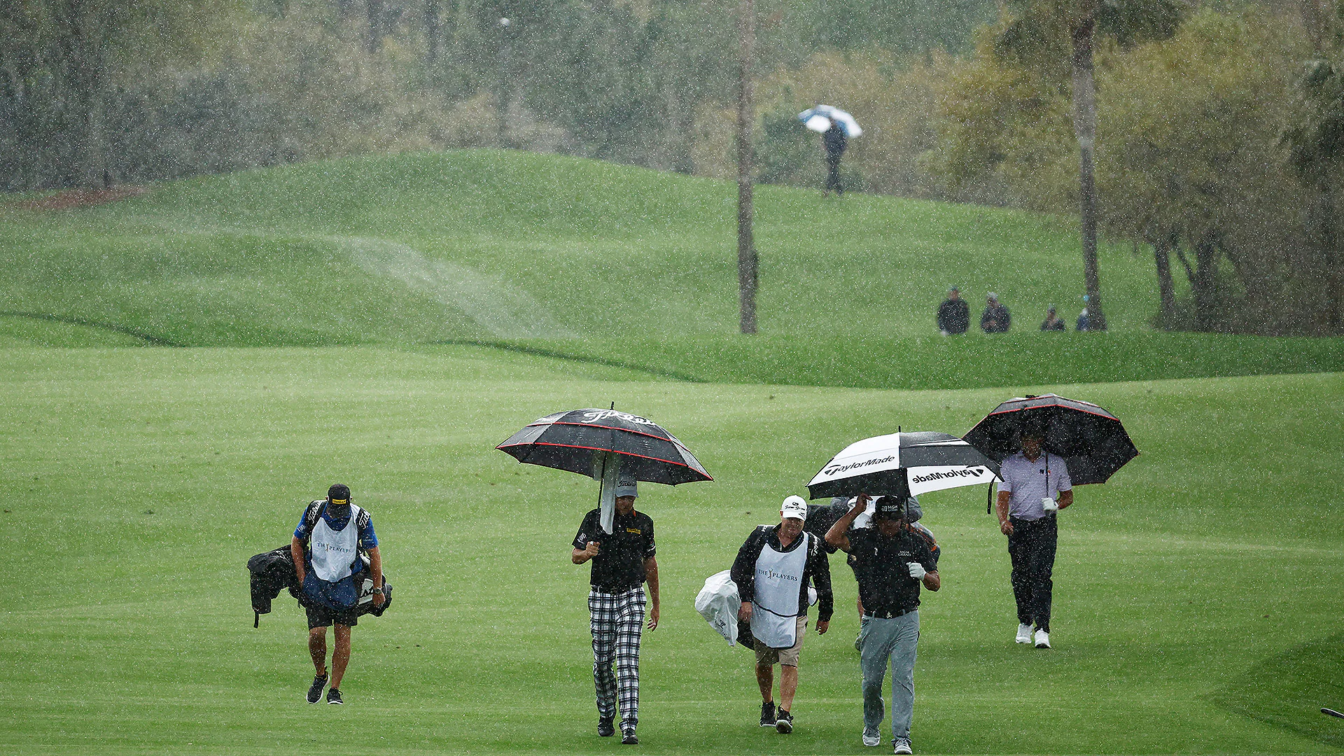 Rain Dominates Players:  Friday's Pretty Much A Wash-Out